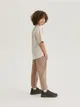 Dresowe spodnie typu jogger, wykonane z przyjemnej w dotyku, bawełnianej dzianiny. - beżowy