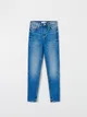 Spodnie jeansowe o dopasowanym kroju skinny uszyte z bawełny z domieszką elastycznych włókien. - turkusowy