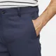 Męskie spodnie chino o dopasowanym kroju do golfa Nike Dri-FIT UV - Niebieski