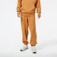 Spodnie męskie New Balance MP23551TOB – pomarańczowe
