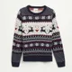 Żakardowy sweter z zimowymi motywami - Wielobarwny