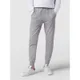 HUGO Spodnie dresowe o kroju slim fit z nadrukiem z logo model ‘Daky’