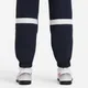 Dresowe spodnie piłkarskie z tkaniny dla dużych dzieci Nike Dri-FIT Academy - Niebieski