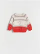 Sweter o prostym fasonie, wykonany z przyjemnej w dotyku, bawełnianej dzianiny. - kremowy