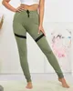 Damskie spodnie dresowe w kolorze zielonym- Odzież - Zielony