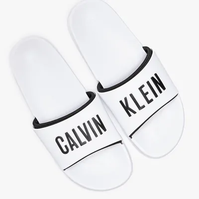 Calvin Klein Klapki Calvin Klein SLIDE KM0KM00633YCD WHITE